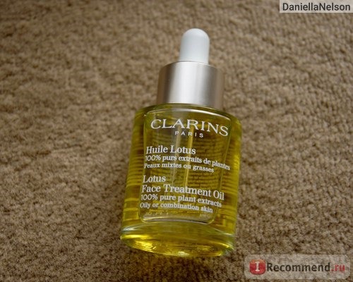 Масло косметическое Clarins Huile Lotus Face Treatment Oil для лица 