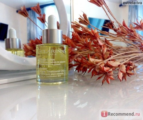 Масло косметическое Clarins Huile Lotus Face Treatment Oil для лица 