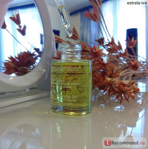 Масло косметическое Clarins Huile Lotus Face Treatment Oil для лица 