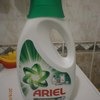 Жидкое средство для стирки Ariel порошок и гель в 1 для белого и цветного фото