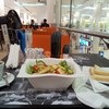 капучино и большая тарелка салато в одном из кафе в 3 терминале - 320 рублей! (37 дирхам)