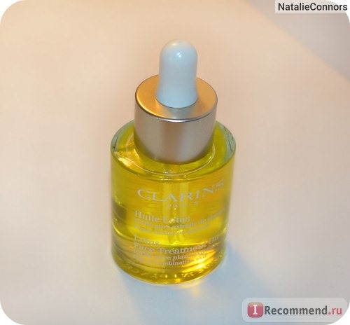 Масло косметическое Clarins Huile Lotus Face Treatment Oil для лица 