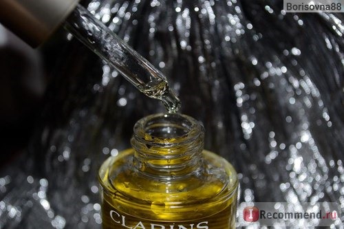 Масло косметическое Clarins Huile Lotus Face Treatment Oil для лица 