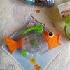 Munchkin Twisty Fish (рыба) - игрушка в ванну фото