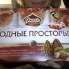 Шоколадные конфеты Россия Родные просторы с миндалем, покрытые шоколадной глазурью и хлопьями с какао фото