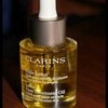 Масло косметическое Clarins Huile Lotus Face Treatment Oil для лица 